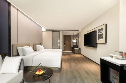 Imagen de la habitación del Hotel Atour Quanzhou Jinjiang Sunshine Plaza. Foto 16