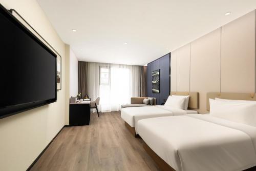 Imagen de la habitación del Hotel Atour Quanzhou Jinjiang Sunshine Plaza. Foto 18
