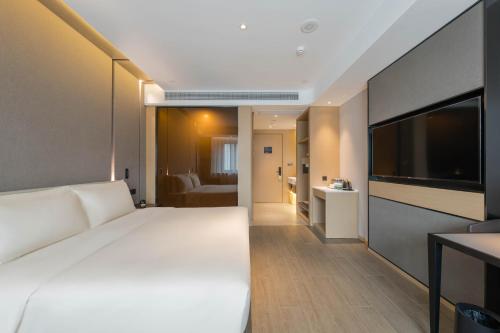 Imagen de la habitación del Hotel Atour Quzhou Nankong. Foto 7