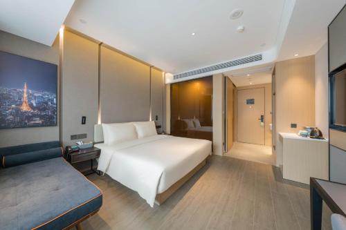 Imagen de la habitación del Hotel Atour Quzhou Nankong. Foto 8