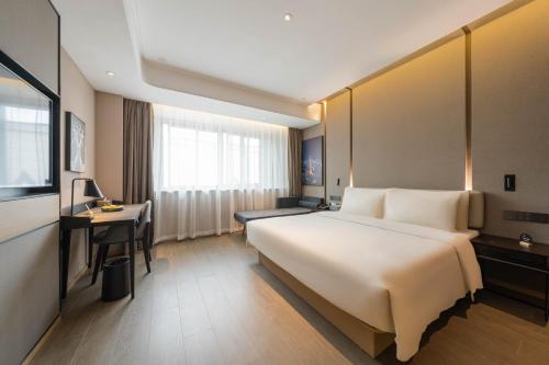 Imagen de la habitación del Hotel Atour Quzhou Nankong. Foto 10