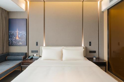 Imagen de la habitación del Hotel Atour Quzhou Nankong. Foto 13