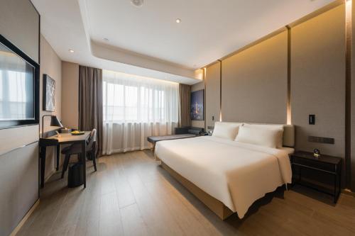 Imagen de la habitación del Hotel Atour Quzhou Nankong. Foto 14