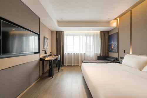 Imagen de la habitación del Hotel Atour Quzhou Nankong. Foto 15