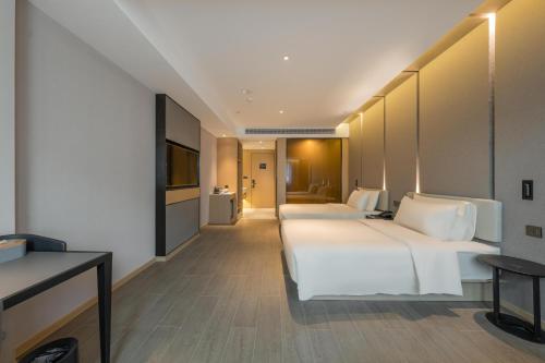 Imagen de la habitación del Hotel Atour Quzhou Nankong. Foto 18