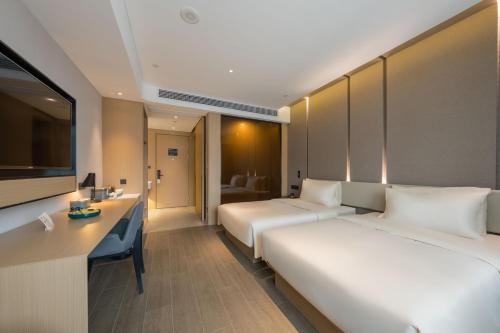 Imagen de la habitación del Hotel Atour Quzhou Nankong. Foto 19