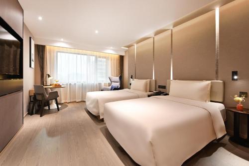 Imagen de la habitación del Hotel Atour S Beijing Anzhen. Foto 4