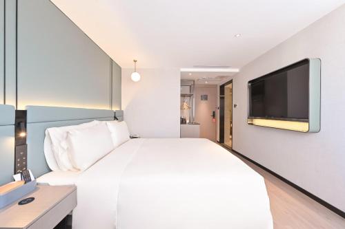 Imagen de la habitación del Hotel Atour S Hotel Beijing Sanlitun Guoan. Foto 5