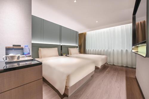 Imagen de la habitación del Hotel Atour S Hotel Beijing Sanlitun Guoan. Foto 6
