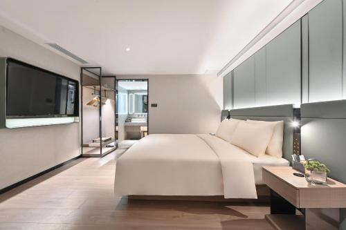 Imagen de la habitación del Hotel Atour S Hotel Beijing Sanlitun Guoan. Foto 7