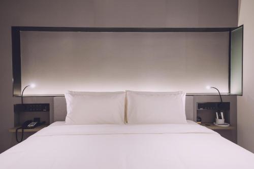 Imagen de la habitación del Hotel Atour S Hotel Shanghai Hongqiao Center Aegean-Late night Congee. Foto 15
