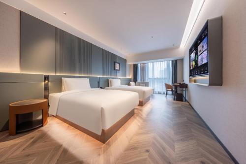 Imagen de la habitación del Hotel Atour S Hotel Shenzhen Luohu Shuibei. Foto 12