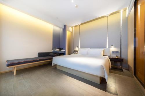 Imagen de la habitación del Hotel Atour S Jinan Baotu Spring. Foto 10
