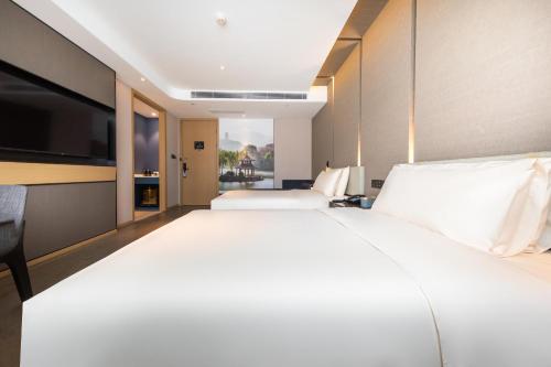 Imagen de la habitación del Hotel Atour S Jinan Baotu Spring. Foto 13