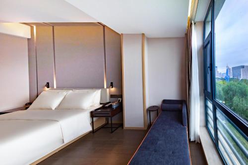 Imagen de la habitación del Hotel Atour S Jinan Baotu Spring. Foto 14