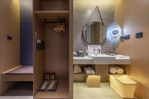 Imagen de la habitación del Hotel Atour S Jinan Baotu Spring. Foto 17
