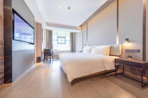 Imagen de la habitación del Hotel Atour S Jinan Baotu Spring. Foto 18