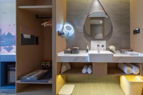 Imagen de la habitación del Hotel Atour S Jinan Baotu Spring. Foto 20