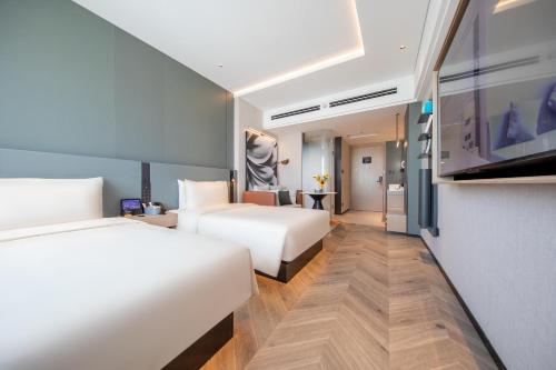Imagen de la habitación del Hotel Atour S Jinan Shunhe. Foto 9