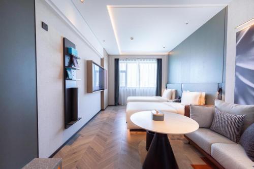 Imagen de la habitación del Hotel Atour S Jinan Shunhe. Foto 10