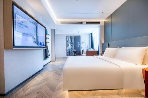 Imagen de la habitación del Hotel Atour S Jinan Shunhe. Foto 11