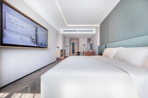 Imagen de la habitación del Hotel Atour S Jinan Shunhe. Foto 19