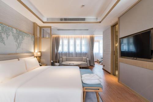 Imagen de la habitación del Hotel Atour S SHanghai Baoshan Gucun Park. Foto 4
