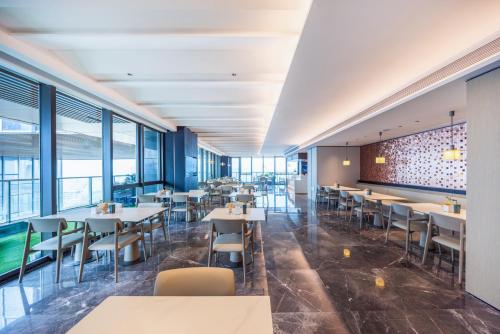 Imagen del bar/restaurante del Hotel Atour S Shenzhen Nanshan Science and Technology Park Aote Coxing. Foto 15