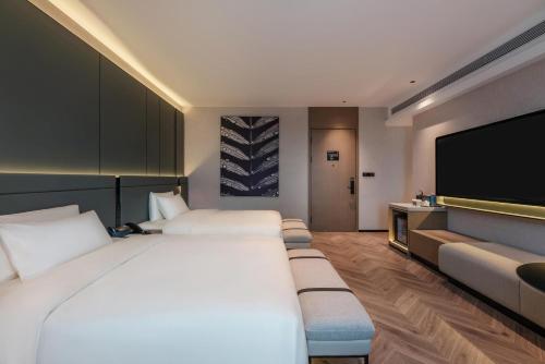 Imagen de la habitación del Hotel Atour S Xiamen Cross-Strait Financial Center. Foto 10