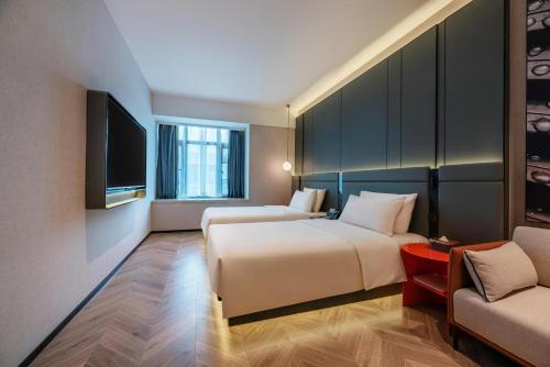 Imagen de la habitación del Hotel Atour S Xiamen Cross-Strait Financial Center. Foto 13