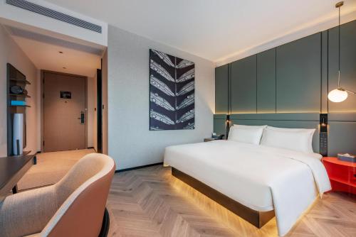 Imagen de la habitación del Hotel Atour S Xiamen Cross-Strait Financial Center. Foto 14