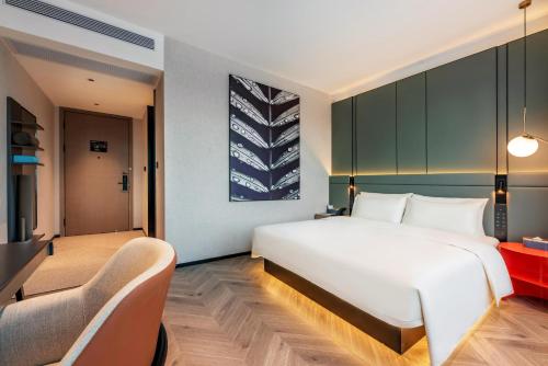 Imagen de la habitación del Hotel Atour S Xiamen Cross-Strait Financial Center. Foto 15