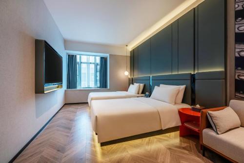 Imagen de la habitación del Hotel Atour S Xiamen Cross-Strait Financial Center. Foto 16