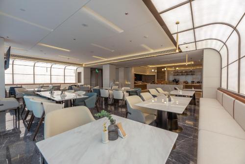 Imagen del bar/restaurante del Hotel Atour S Xiamen Cross-Strait Financial Center. Foto 9