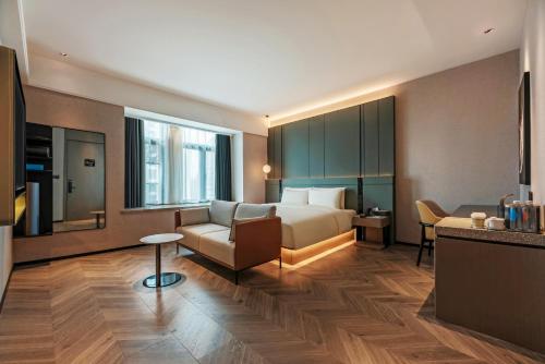 Imagen de la habitación del Hotel Atour S Xiamen Cross-Strait Financial Center. Foto 18