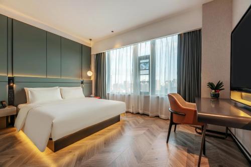 Imagen de la habitación del Hotel Atour S Xiamen Cross-Strait Financial Center. Foto 19