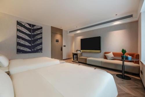 Imagen de la habitación del Hotel Atour S Xiamen Cross-Strait Financial Center. Foto 20