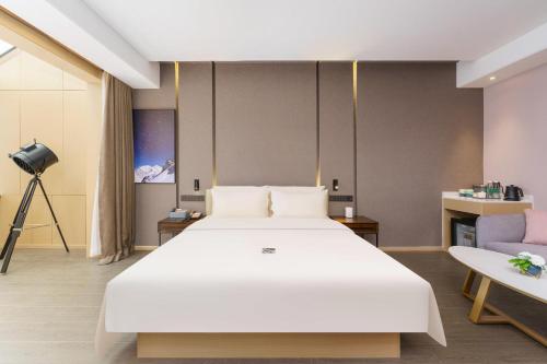 Imagen de la habitación del Hotel Atour S Xinghai Square. Foto 11
