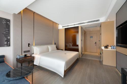 Imagen de la habitación del Hotel Atour S Xinghai Square. Foto 13