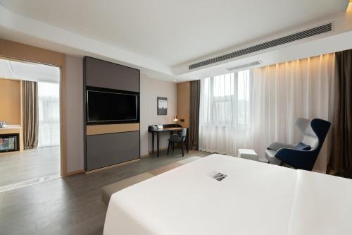 Imagen de la habitación del Hotel Atour S Xinghai Square. Foto 15