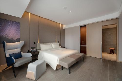 Imagen de la habitación del Hotel Atour S Xinghai Square. Foto 19