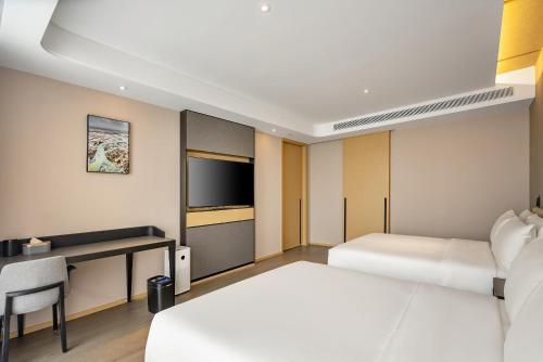 Imagen de la habitación del Hotel Atour S Xining Haihu New District SDIC Plaza. Foto 19