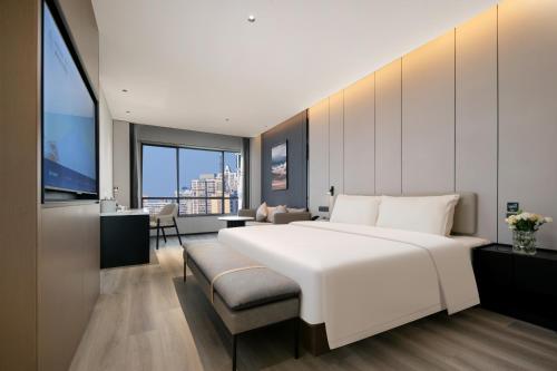 Imagen de la habitación del Hotel Atour Shanghai Baoshan Shangda Road. Foto 12