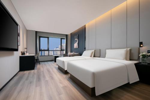 Imagen de la habitación del Hotel Atour Shanghai Baoshan Shangda Road. Foto 14