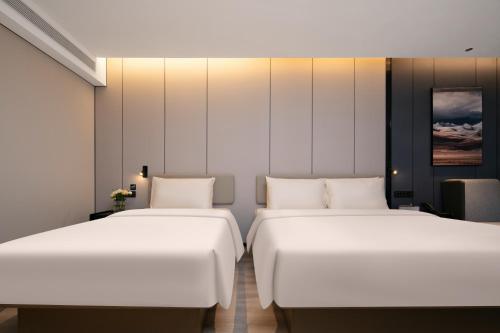 Imagen de la habitación del Hotel Atour Shanghai Baoshan Shangda Road. Foto 15
