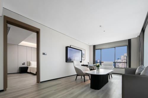 Imagen de la habitación del Hotel Atour Shanghai Baoshan Shangda Road. Foto 16