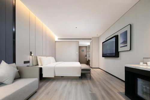 Imagen de la habitación del Hotel Atour Shanghai Baoshan Shangda Road. Foto 17