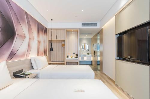 Imagen de la habitación del Hotel Atour Shanghai Hongqiao Korea Street. Foto 11