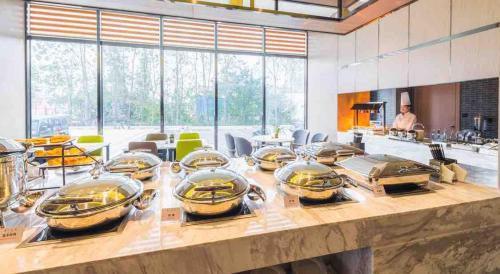Imagen del bar/restaurante del Hotel Atour (Shanghai International Tourism and Resorts Zone XiuYan Road). Foto 13