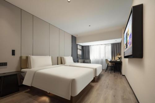 Imagen de la habitación del Hotel Atour Shanghai Lujiazui South Pudong Road. Foto 16